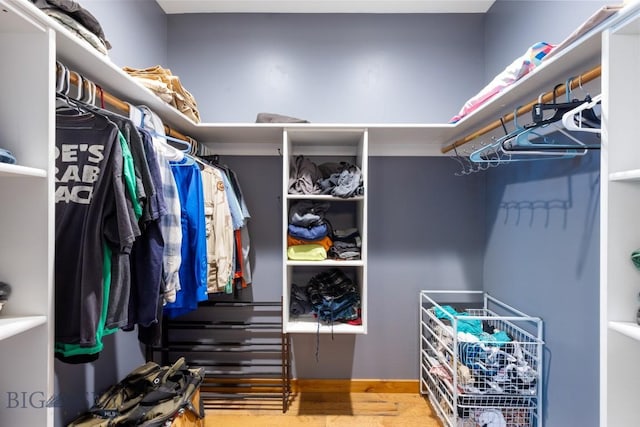 680 Countryside Ln, Belgrade, MT 59714 - spacious closet featuring wood finished floors
