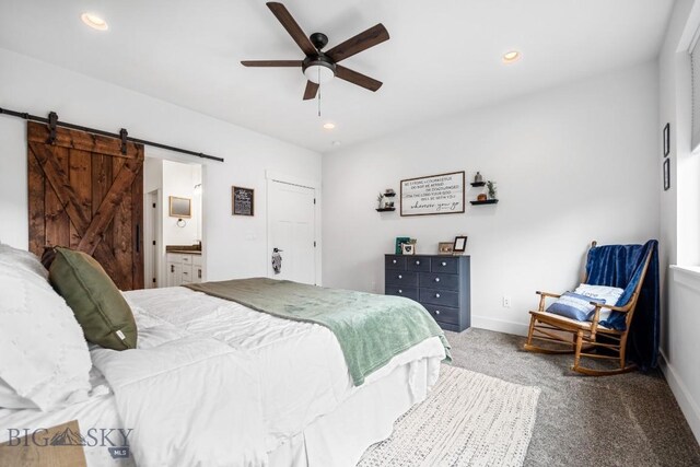 1506 Wild Bill Way, Belgrade, MT 59714 - bedroom with a barn door, carpet flooring, baseboards, recessed lighting, and a ceiling fan