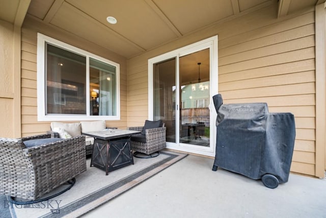 1506 Wild Bill Way, Belgrade, MT 59714 - view of patio / terrace featuring grilling area and an outdoor living space with a fire pit