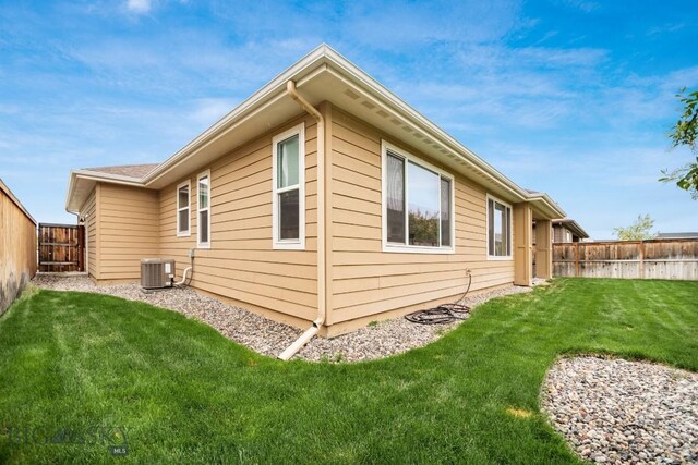 1506 Wild Bill Way, Belgrade, MT 59714 - view of side of property featuring central AC unit