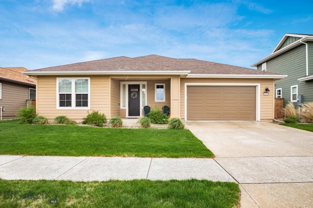 1506 Wild Bill Way, Belgrade, MT 59714 - single story home featuring an attached garage, driveway, and a front lawn