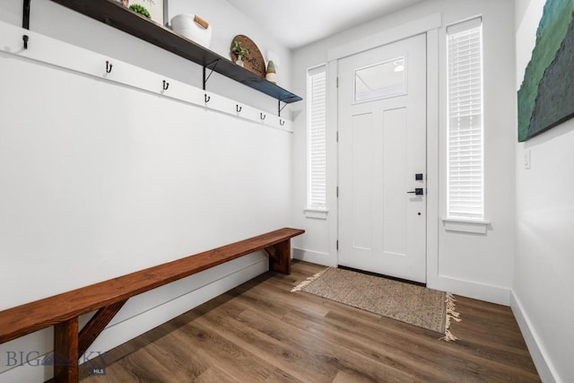 1506 Wild Bill Way, Belgrade, MT 59714 - mudroom featuring baseboards and wood finished floors