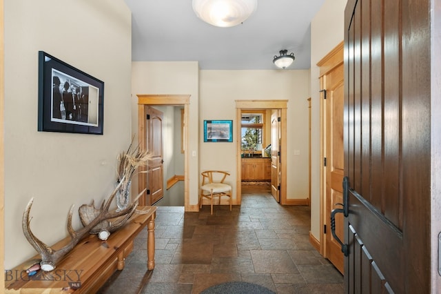 1220 Green Valley Way, Bozeman, MT 59715 - entryway featuring stone tile floors and baseboards
