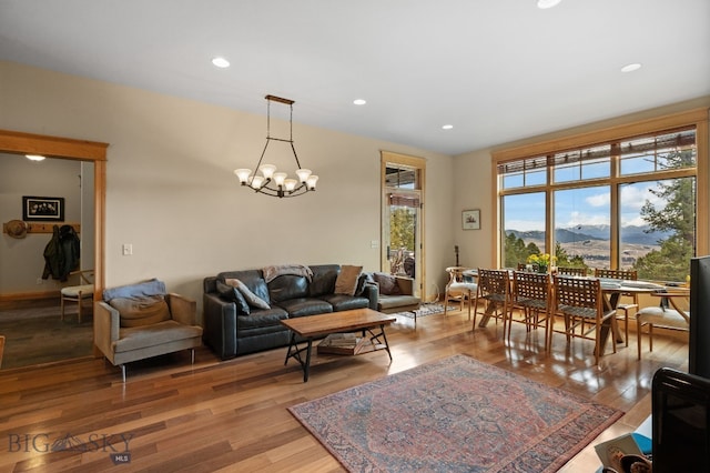 1220 Green Valley Way, Bozeman, MT 59715 - living room featuring light wood-style flooring, a chandelier, recessed lighting, and a mountain view