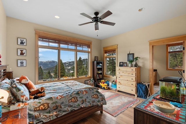 1220 Green Valley Way, Bozeman, MT 59715 - bedroom featuring wood finished floors, recessed lighting, and a ceiling fan