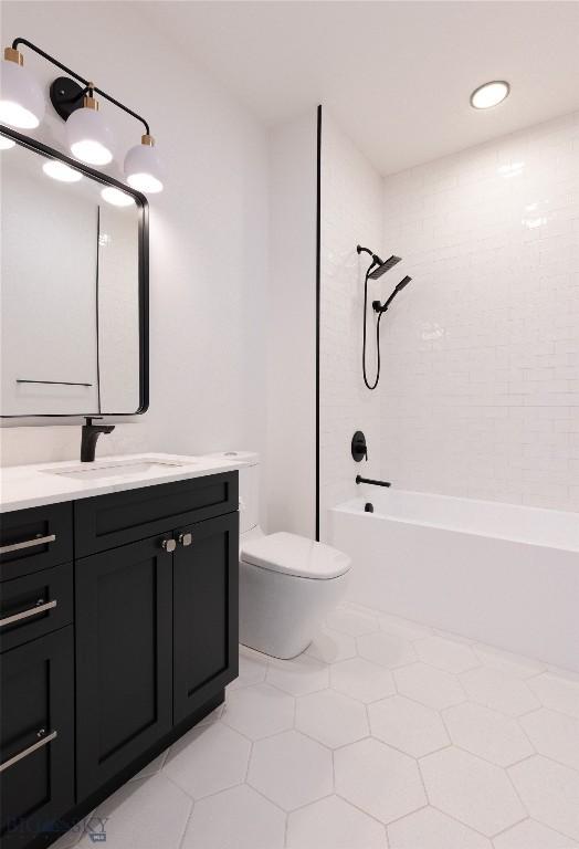 full bath featuring vanity, tub / shower combination, toilet, and tile patterned flooring