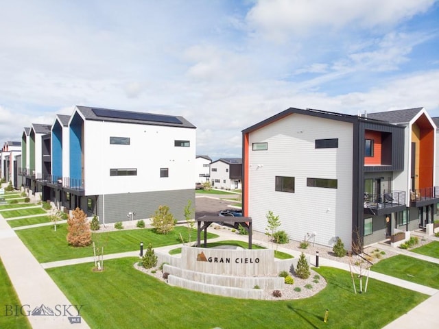 view of property with a residential view
