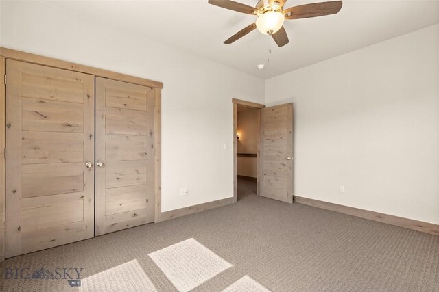 3164 S 15th Ave, Bozeman, MT 59715 - unfurnished bedroom with carpet floors, baseboards, and ceiling fan