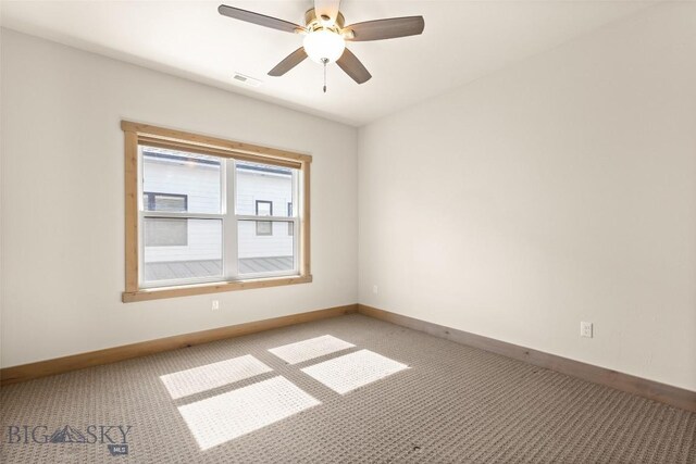 3164 S 15th Ave, Bozeman, MT 59715 - unfurnished room with baseboards, light colored carpet, and a ceiling fan