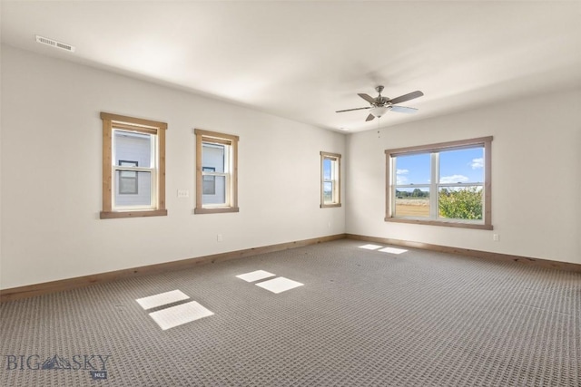 3164 S 15th Ave, Bozeman, MT 59715 - unfurnished room featuring carpet floors, baseboards, and a ceiling fan
