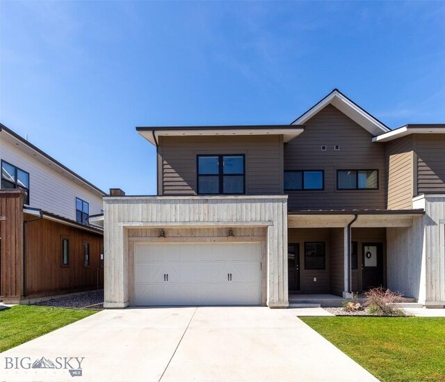 3164 S 15th Ave, Bozeman, MT 59715 - view of front of property with concrete driveway and an attached garage