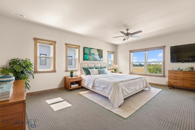 3164 S 15th Ave, Bozeman, MT 59715 - bedroom featuring baseboards, light colored carpet, and ceiling fan