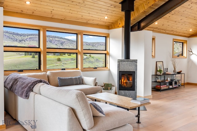 94 Rock Castle Rd, Manhattan, MT 59741 - living area featuring recessed lighting, vaulted ceiling, wooden ceiling, healthy amount of natural light, and light wood finished floors
