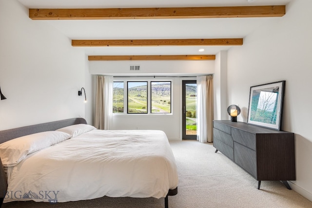 94 Rock Castle Rd, Manhattan, MT 59741 - bedroom featuring light carpet, access to exterior, and beamed ceiling