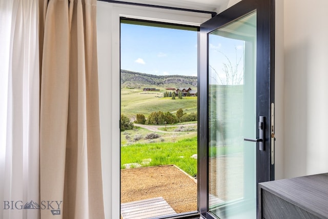 94 Rock Castle Rd, Manhattan, MT 59741 - doorway to outside with a mountain view