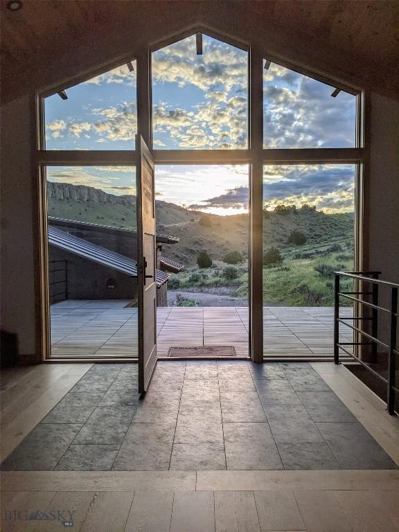 94 Rock Castle Rd, Manhattan, MT 59741 - doorway to outside with lofted ceiling