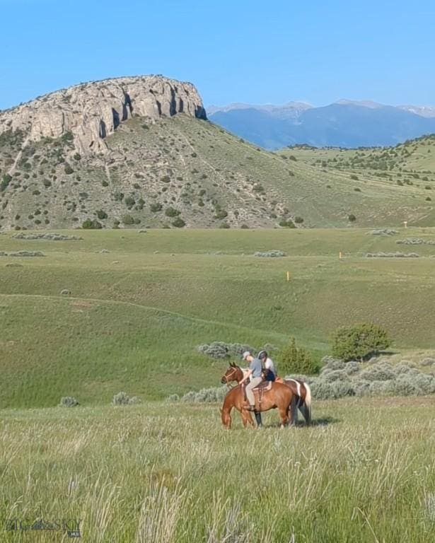 94 Rock Castle Rd, Manhattan, MT 59741 - view of mountain backdrop with rural landscape and agricultural land