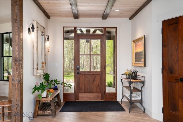 17450 Wilson Creek Rd, Bozeman, MT 59730 - foyer featuring wooden ceiling, wood finished floors, beam ceiling, and baseboards