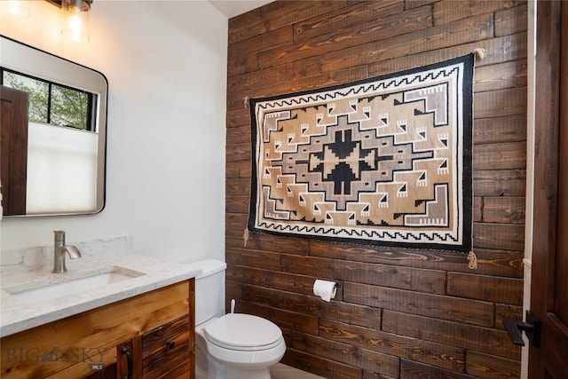 17450 Wilson Creek Rd, Gallatin Gateway, MT 59730 - half bathroom with vanity and wood walls