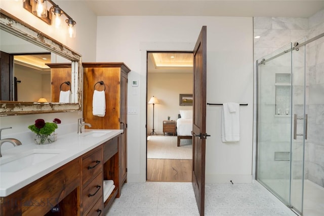 17450 Wilson Creek Rd, Gallatin Gateway, MT 59730 - ensuite bathroom featuring double vanity, tile patterned floors, and a stall shower