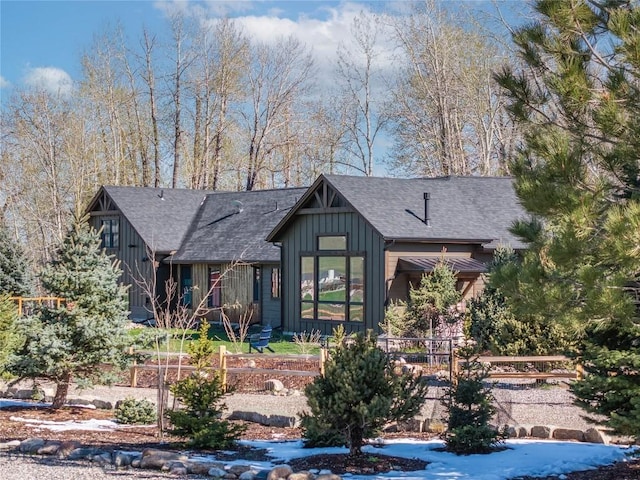 17450 Wilson Creek Rd, Gallatin Gateway, MT 59730 - view of front of house featuring board and batten siding and a shingled roof