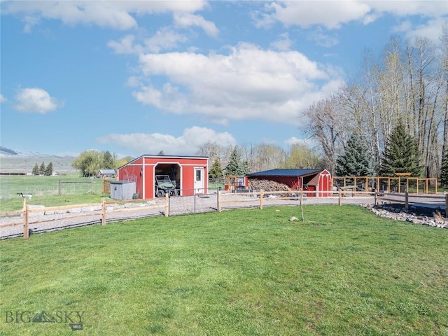17450 Wilson Creek Rd, Gallatin Gateway, MT 59730 - view of yard featuring an outbuilding and a garage