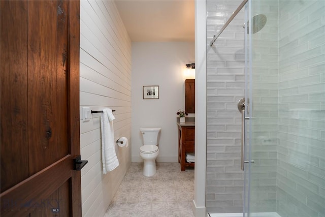 17450 Wilson Creek Rd, Gallatin Gateway, MT 59730 - bathroom featuring a shower stall, vanity, tile patterned floors, and wooden walls