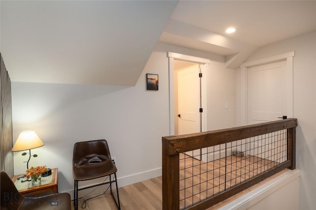 17450 Wilson Creek Rd, Bozeman, MT 59730 - hall featuring wood finished floors, baseboards, vaulted ceiling, and recessed lighting