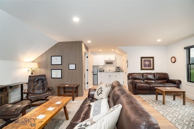 17450 Wilson Creek Rd, Bozeman, MT 59730 - living room featuring recessed lighting, vaulted ceiling, baseboards, and light wood finished floors