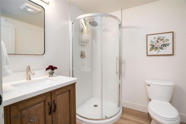 17450 Wilson Creek Rd, Gallatin Gateway, MT 59730 - full bathroom featuring vanity, wood finished floors, and a stall shower