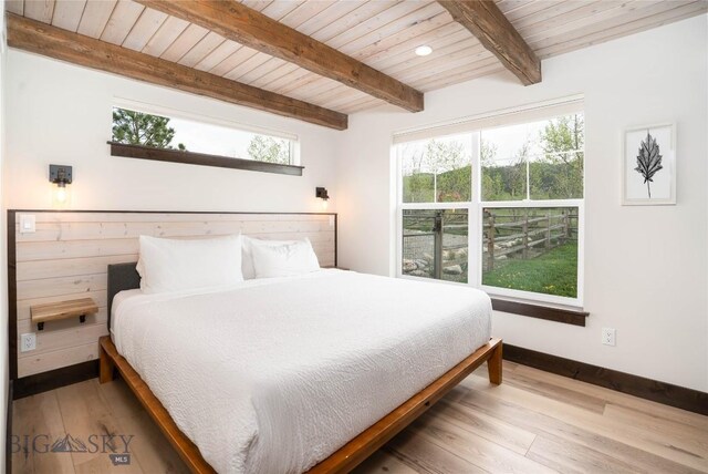 17450 Wilson Creek Rd, Gallatin Gateway, MT 59730 - bedroom with a wood ceiling with exposed beams and wood finished floors