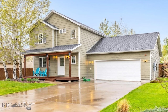 185 Chestnut Grove Ave, Bozeman, MT 59718 - view of front of house with concrete driveway, a porch, a garage, and roof with shingles