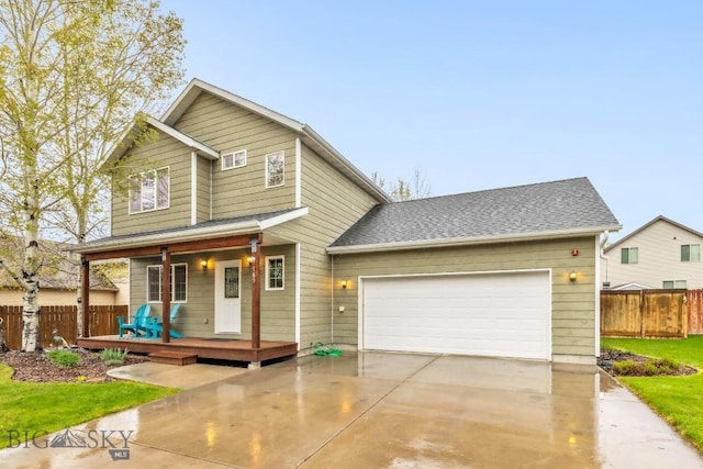 185 Chestnut Grove Ave, Bozeman, MT 59718 - traditional home with a porch, driveway, and a garage