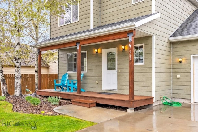 185 Chestnut Grove Ave, Bozeman, MT 59718 - property entrance with a shingled roof and a porch