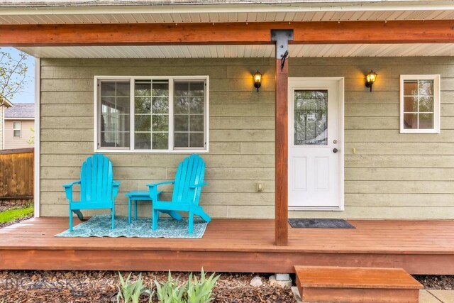 185 Chestnut Grove Ave, Bozeman, MT 59718 - property entrance featuring a wooden deck
