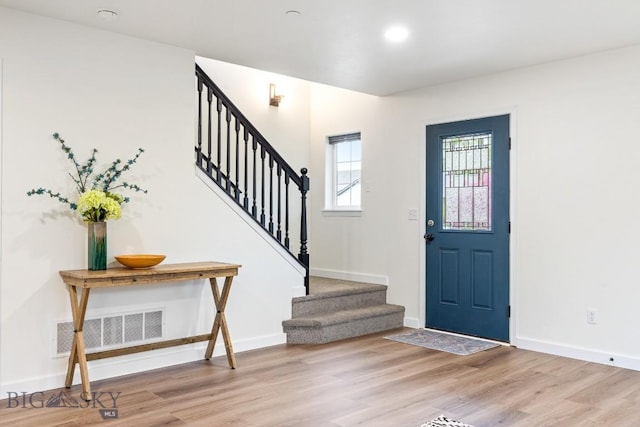 185 Chestnut Grove Ave, Bozeman, MT 59718 - entryway featuring stairway, wood finished floors, and baseboards