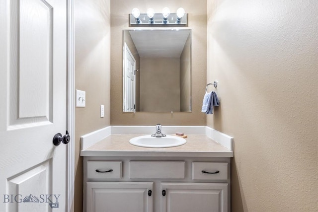 185 Chestnut Grove Ave, Bozeman, MT 59718 - bathroom featuring vanity and a textured wall