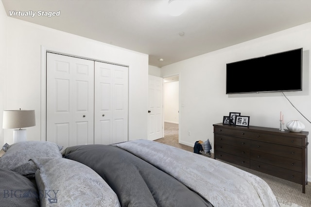 185 Chestnut Grove Ave, Bozeman, MT 59718 - bedroom with carpet floors, a closet, and baseboards