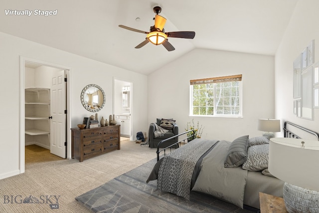 185 Chestnut Grove Ave, Bozeman, MT 59718 - bedroom with carpet, vaulted ceiling, a walk in closet, ensuite bathroom, and ceiling fan