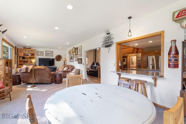 486 Jardine Rd, Jardine, MT 59030 - dining space with light carpet and recessed lighting