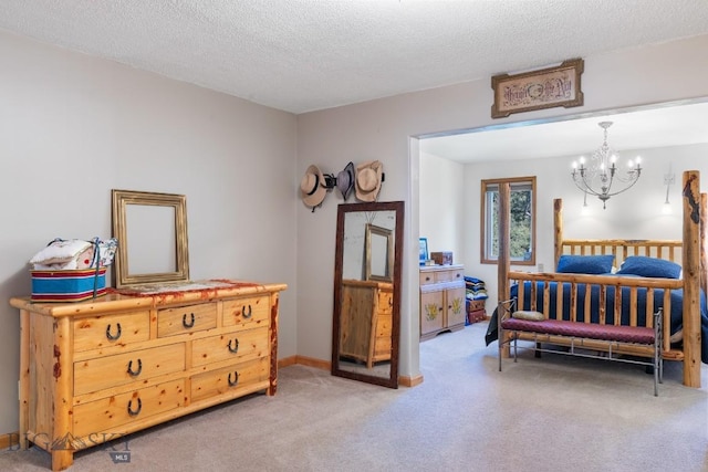 486 Jardine Rd, Jardine, MT 59030 - bedroom with light colored carpet, a chandelier, and a textured ceiling