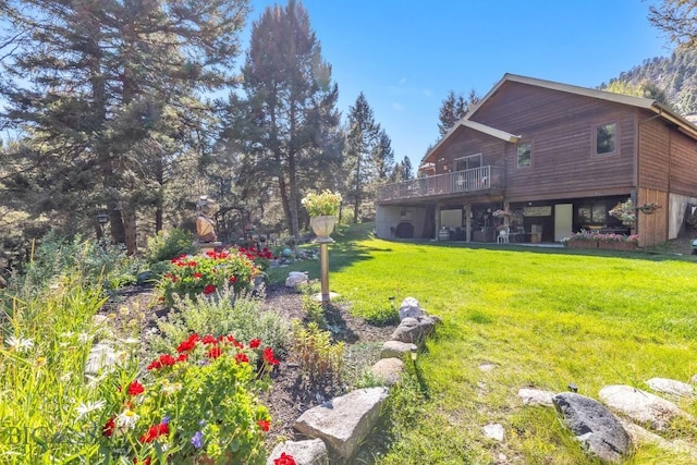 486 Jardine Rd, Jardine, MT 59030 - view of green lawn with a wooden deck