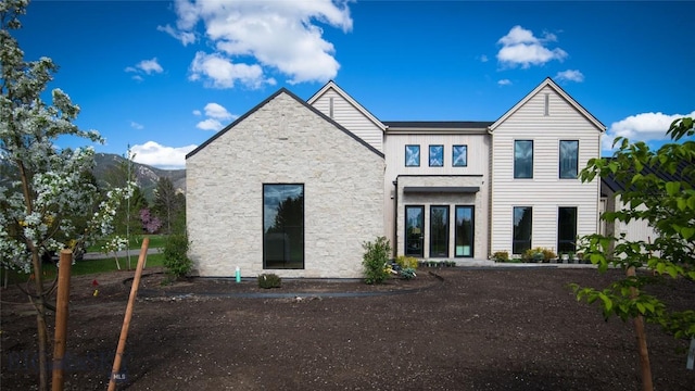 2276 Snow Flake Ct, Bozeman, MT 59715 - back of property featuring stone siding