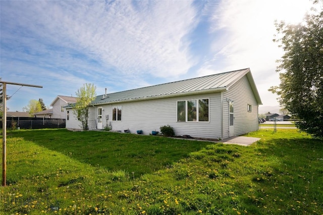 607 N Hoffman St, Belgrade, MT 59714 - back of house with a standing seam roof and metal roof