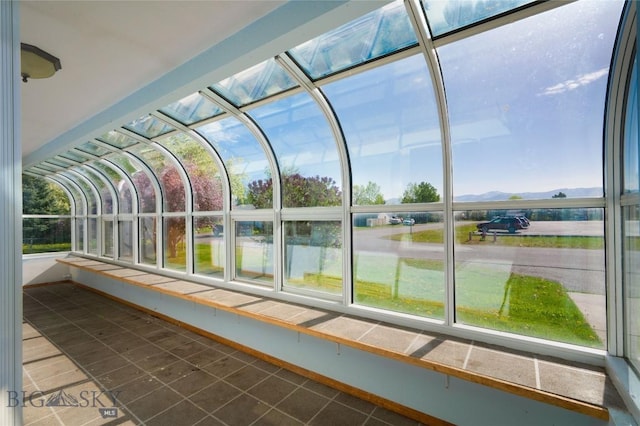 607 N Hoffman St, Belgrade, MT 59714 - unfurnished sunroom with a mountain view