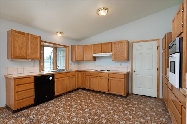 607 N Hoffman St, Belgrade, MT 59714 - kitchen featuring white appliances, a sink, under cabinet range hood, and lofted ceiling