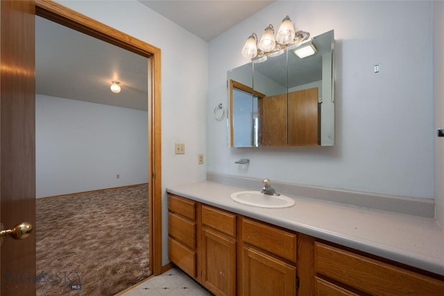 607 N Hoffman St, Belgrade, MT 59714 - bathroom featuring vanity and tile patterned floors