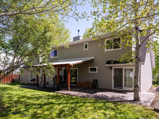 507 Flathead Ave, Bozeman, MT 59718 - back of property featuring a patio area and a chimney