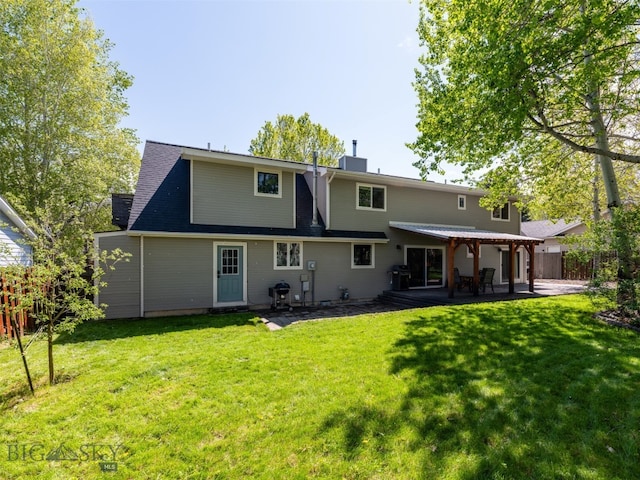 507 Flathead Ave, Bozeman, MT 59718 - back of property featuring a patio area and a chimney