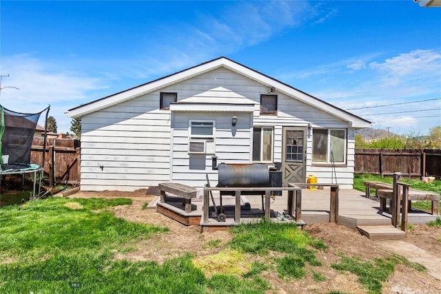 1408 Dewey Blvd, Butte, MT 59701 - back of house featuring a trampoline and a deck
